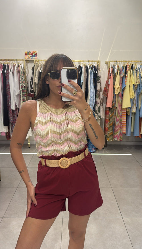 Shorts con cinta in paglia