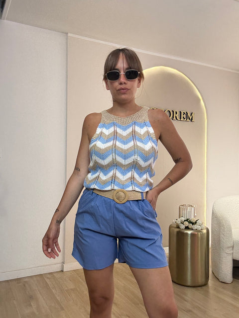 Shorts con cinta in paglia