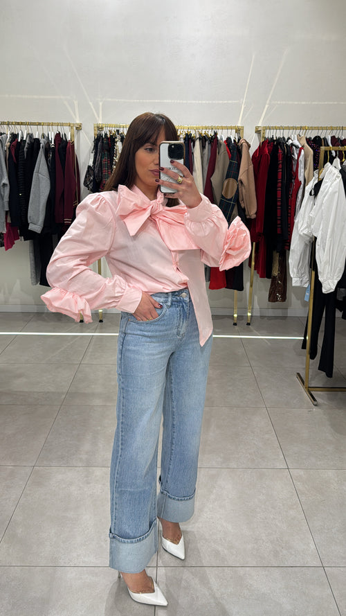 Jeans piegone cucito