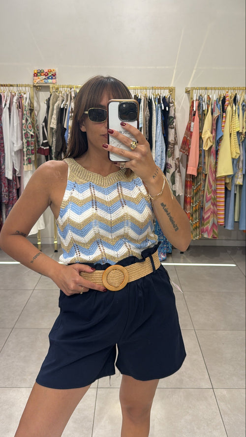 Shorts con cinta in paglia