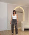 Jeans con finta camicia in vita