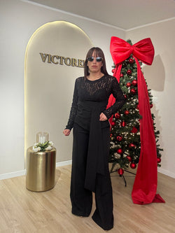 Pantalone gamba ampia particolare