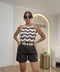 Shorts con cinta in paglia