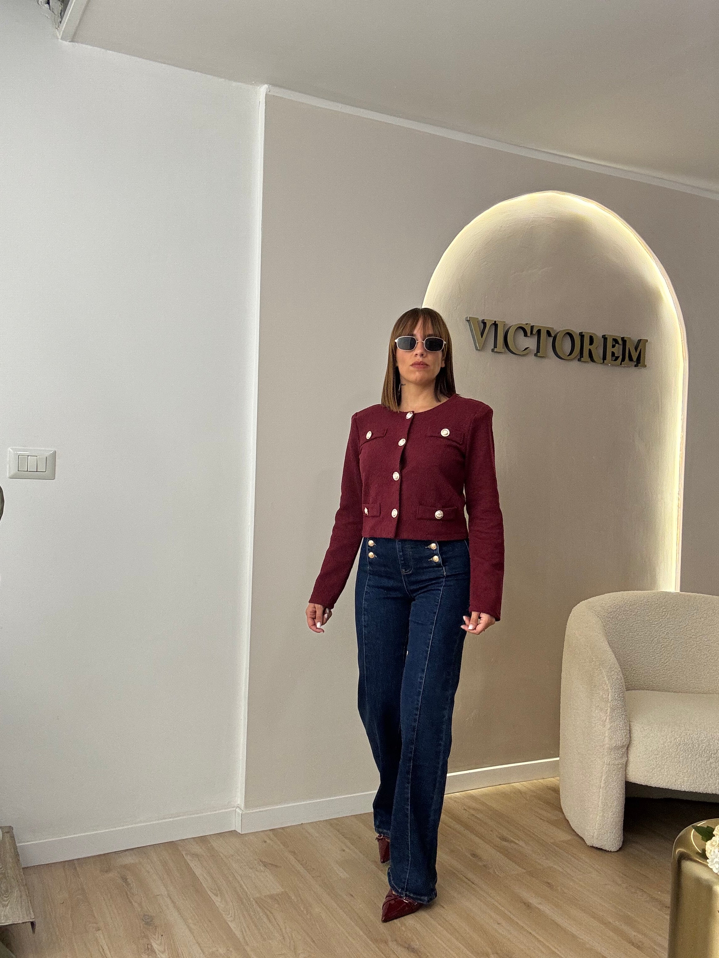 Jeans bottoni oro