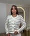 Cardigan rigato con bottoncini
