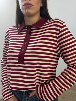 Polo con bottoni riga