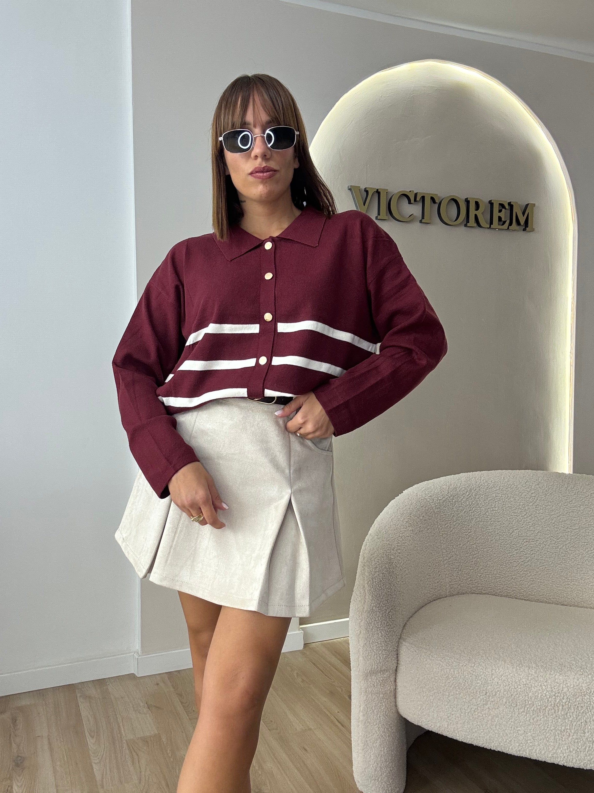 Polo con bottoni gold